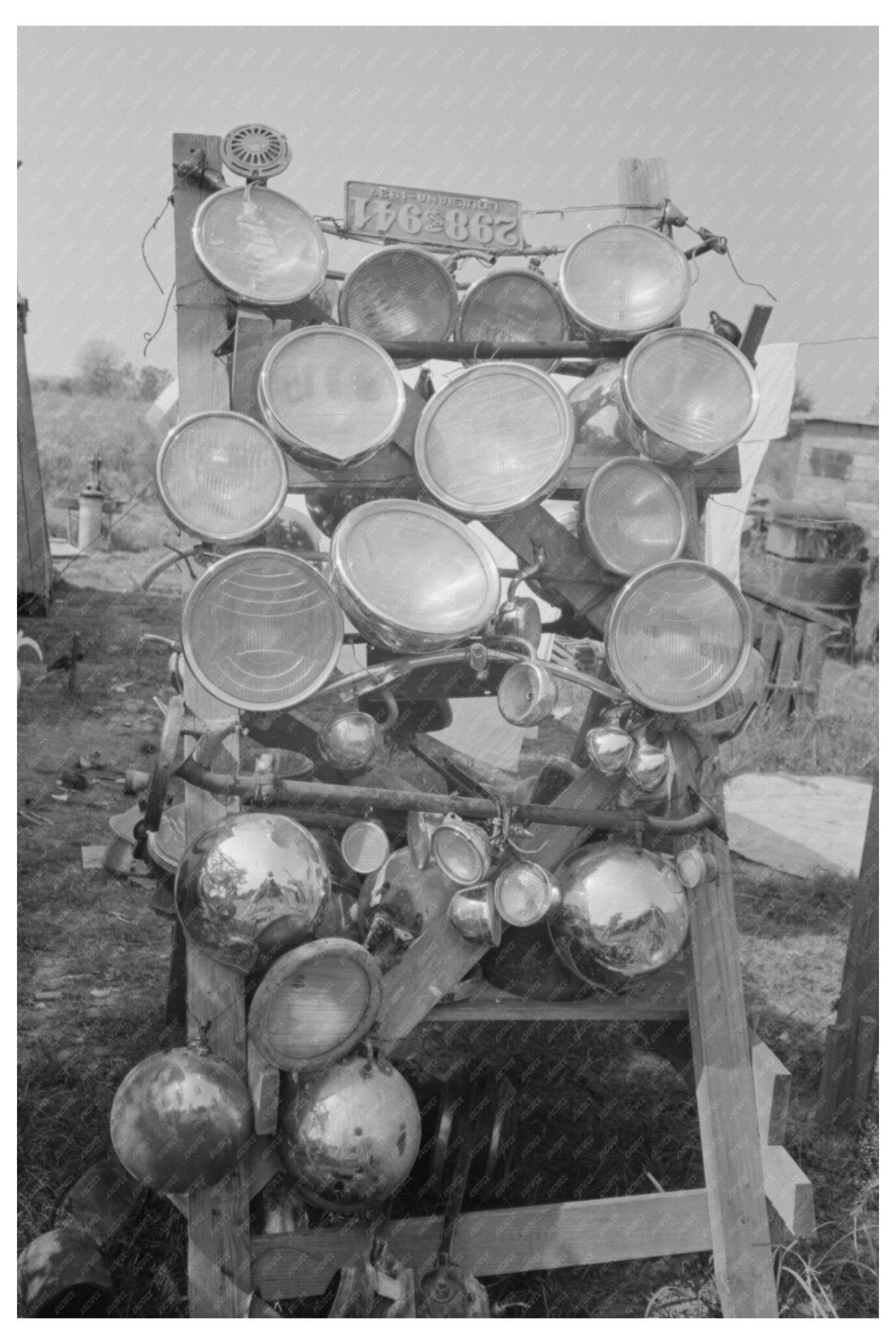 1938 Vintage Junkyard Headlight Display in Abbeville Louisiana - Available at KNOWOL