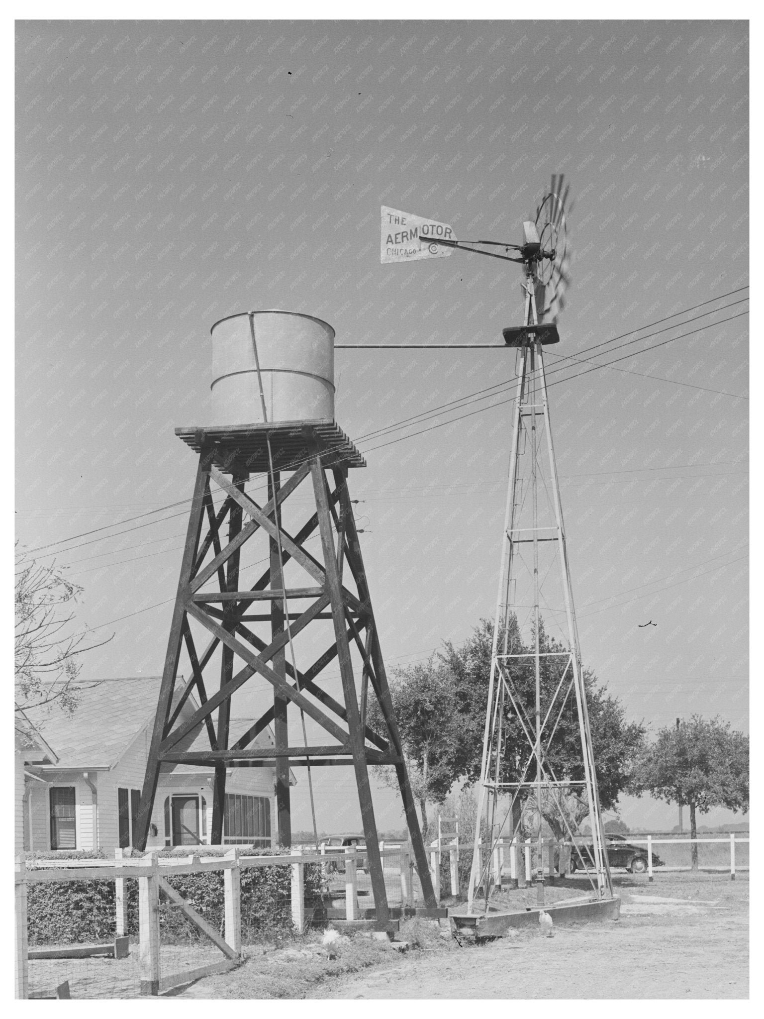 1938 Windmill and Water Tower at Joseph La Blanc Home - Available at KNOWOL