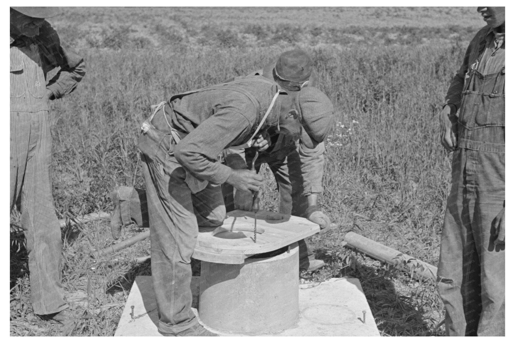 1938 Workers Fitting Seat on Privy at Southeast Missouri Farms - Available at KNOWOL