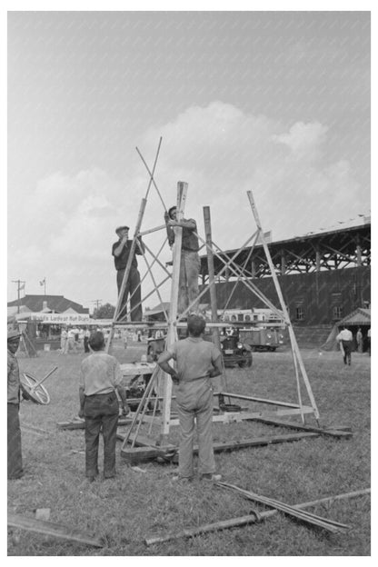 1938 Workers Setting Up Amusement Device in Louisiana Fair - Available at KNOWOL