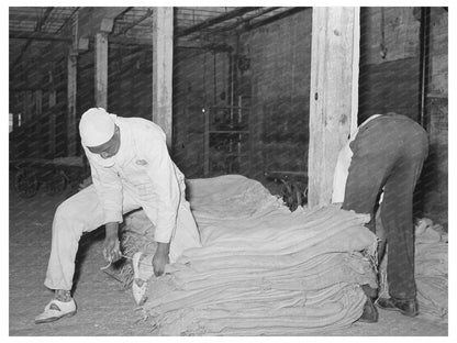 1938 Workers Sewing Burlap Sacks at Louisiana Rice Mill - Available at KNOWOL