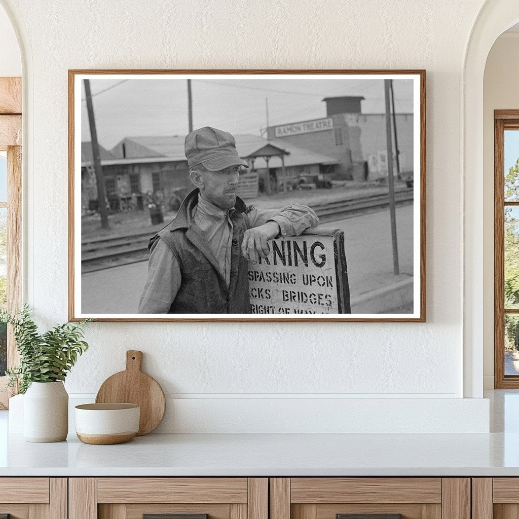 1939 Day Laborer Resting by Railroad in Raymondville Texas - Available at KNOWOL