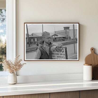 1939 Day Laborer Resting by Railroad in Raymondville Texas - Available at KNOWOL