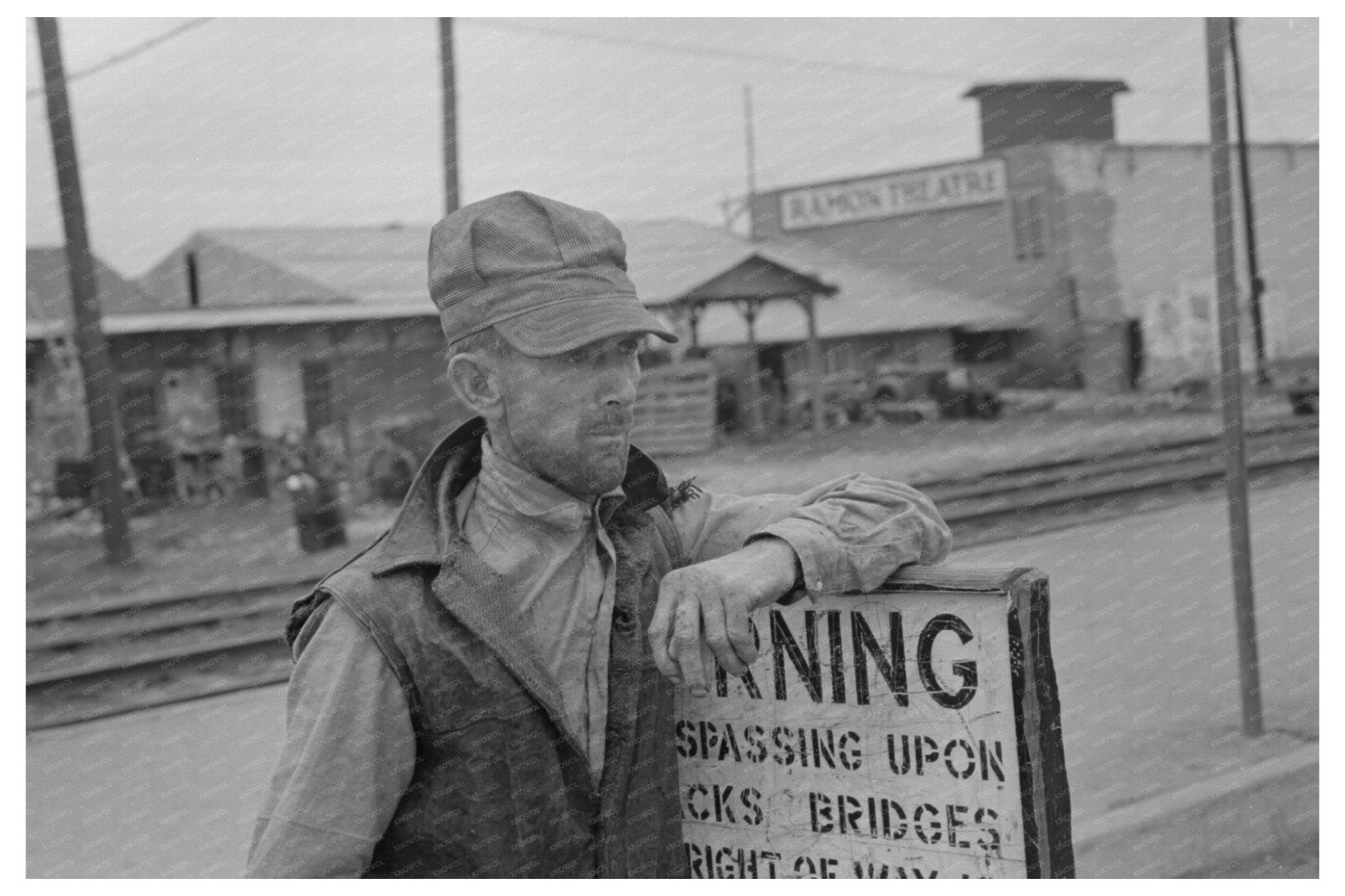 1939 Day Laborer Resting by Railroad in Raymondville Texas - Available at KNOWOL