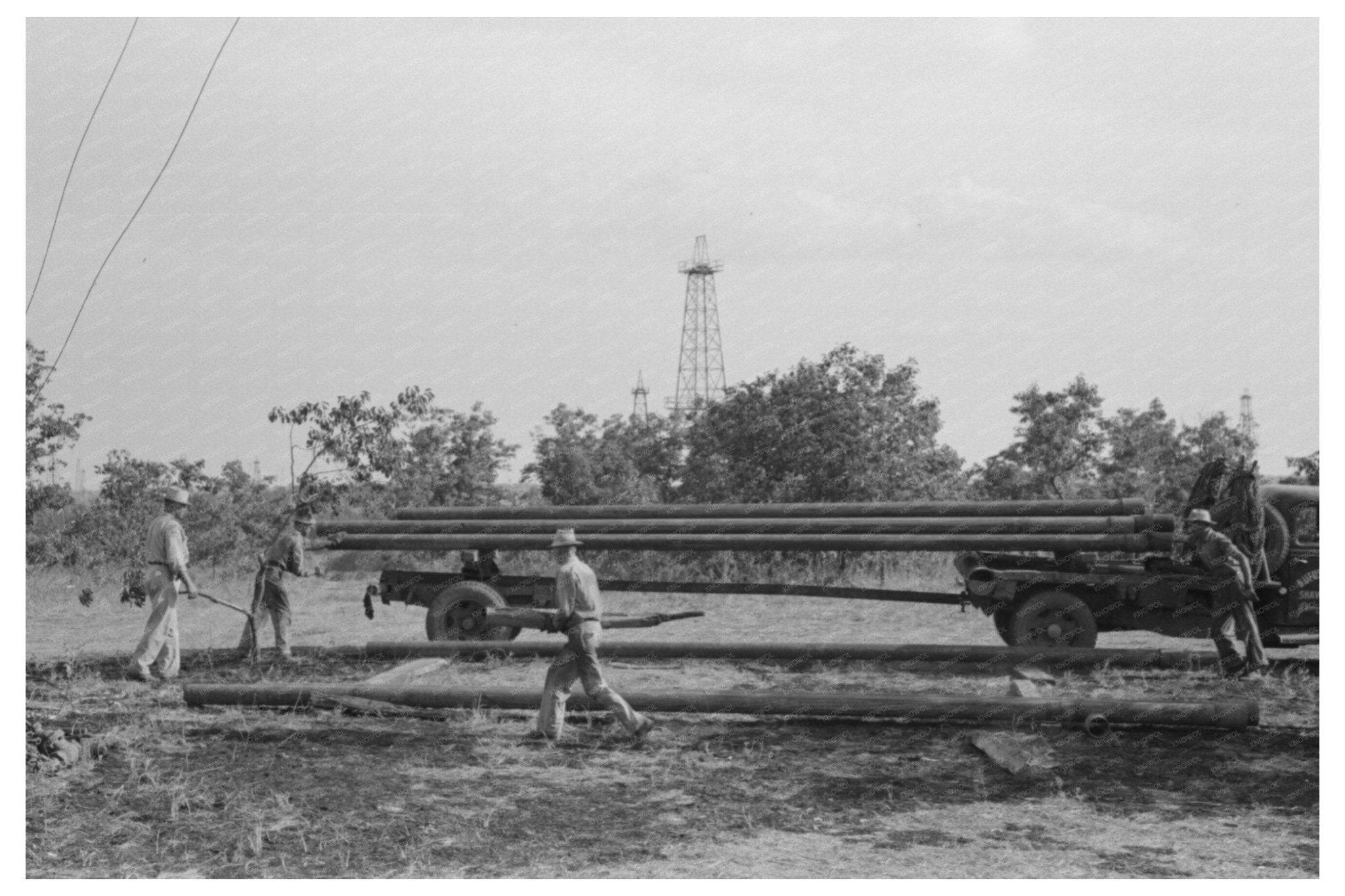 1939 Pipe Unloading at Seminole Oil Field Oklahoma - Available at KNOWOL