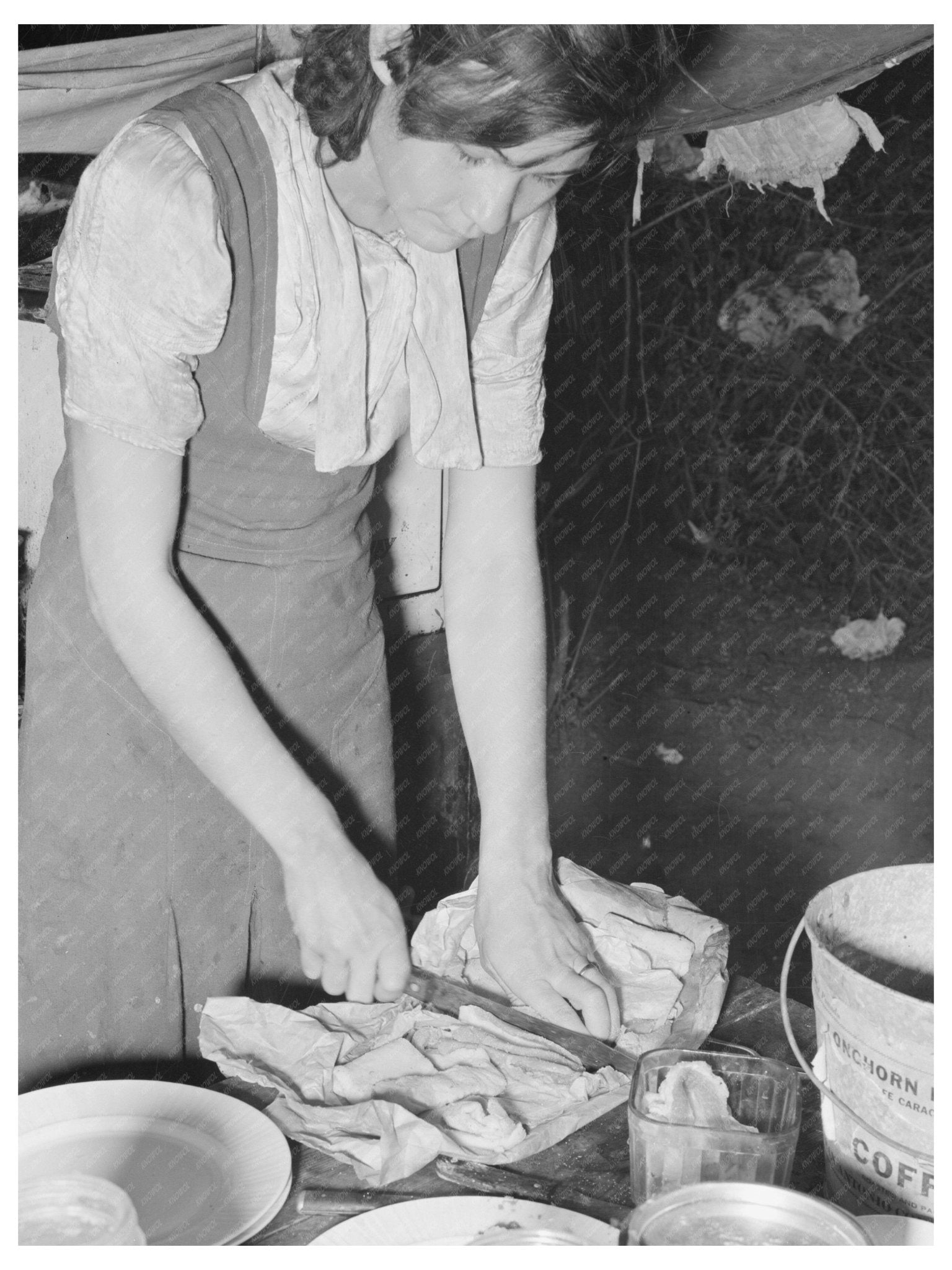 1939 Vintage Image of Migrant Worker Preparing Salt Meat - Available at KNOWOL