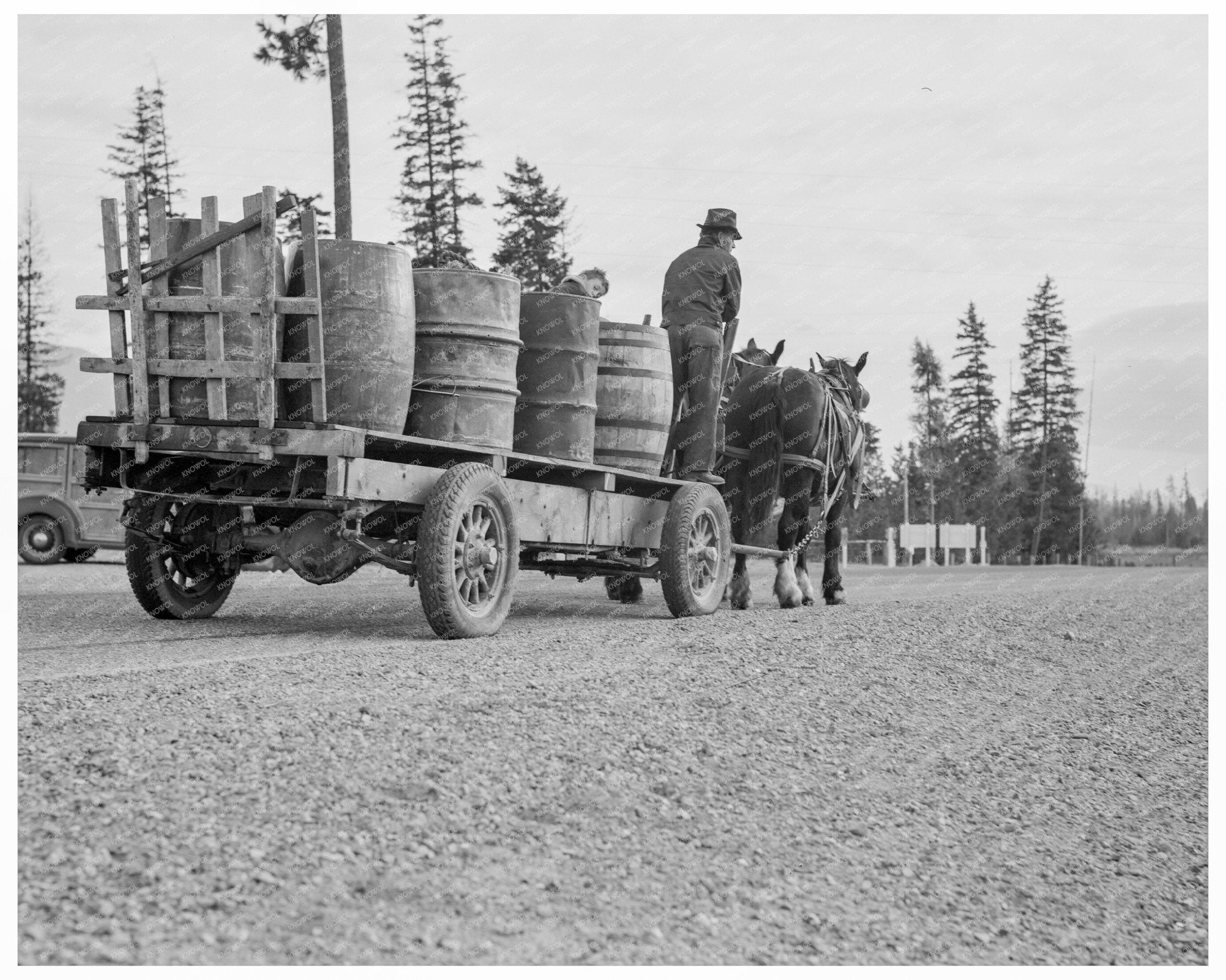 1939 Vintage Photo of Farmer and Son Hauling Water Idaho - Available at KNOWOL