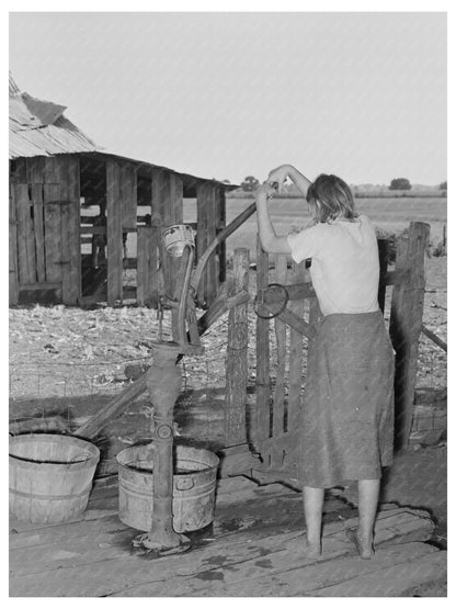 1939 Vintage Photo of Farmers Daughter Pumping Water - Available at KNOWOL