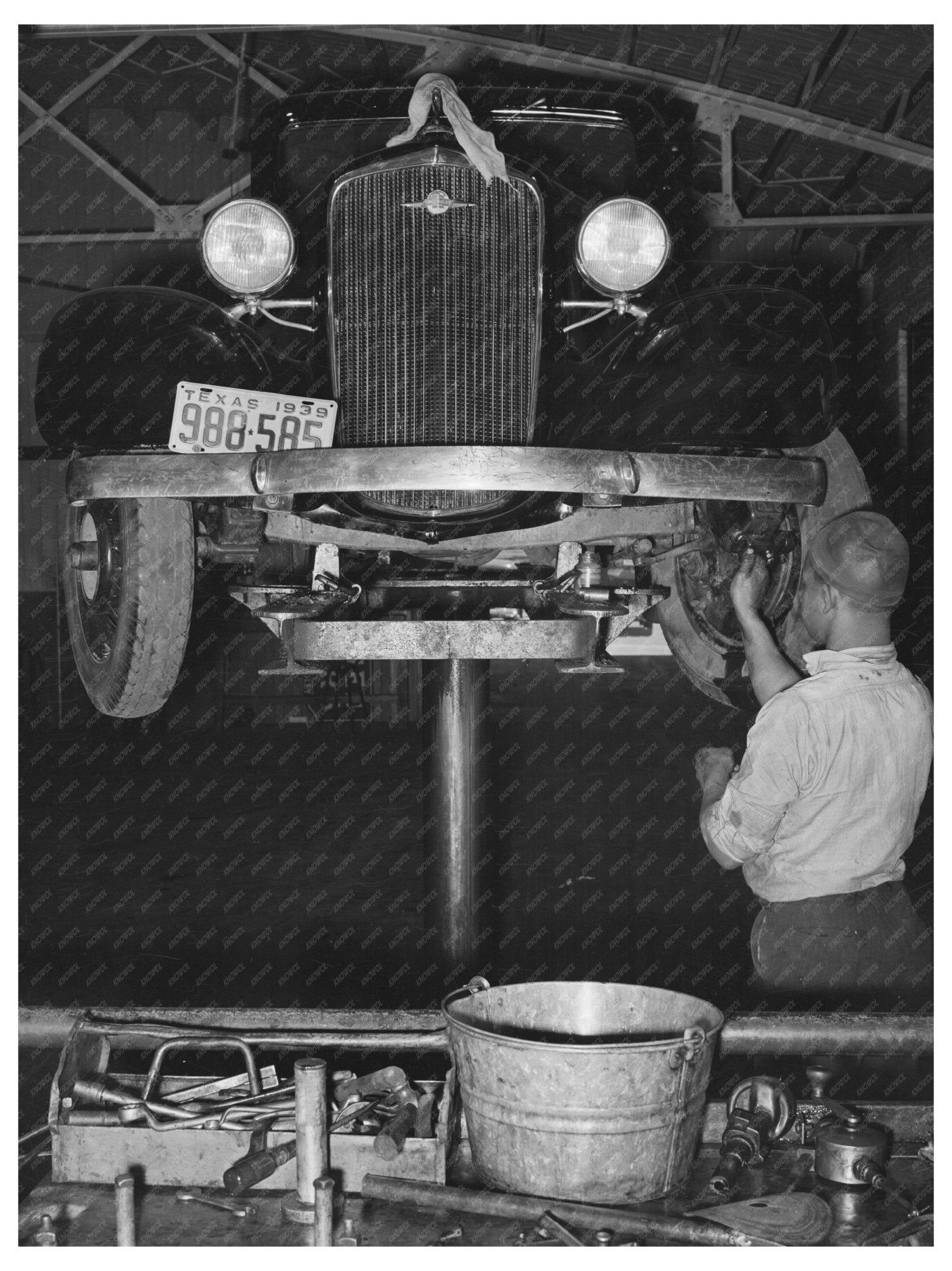 1939 Vintage Photograph of Man Greasing Car in Garage Texas - Available at KNOWOL