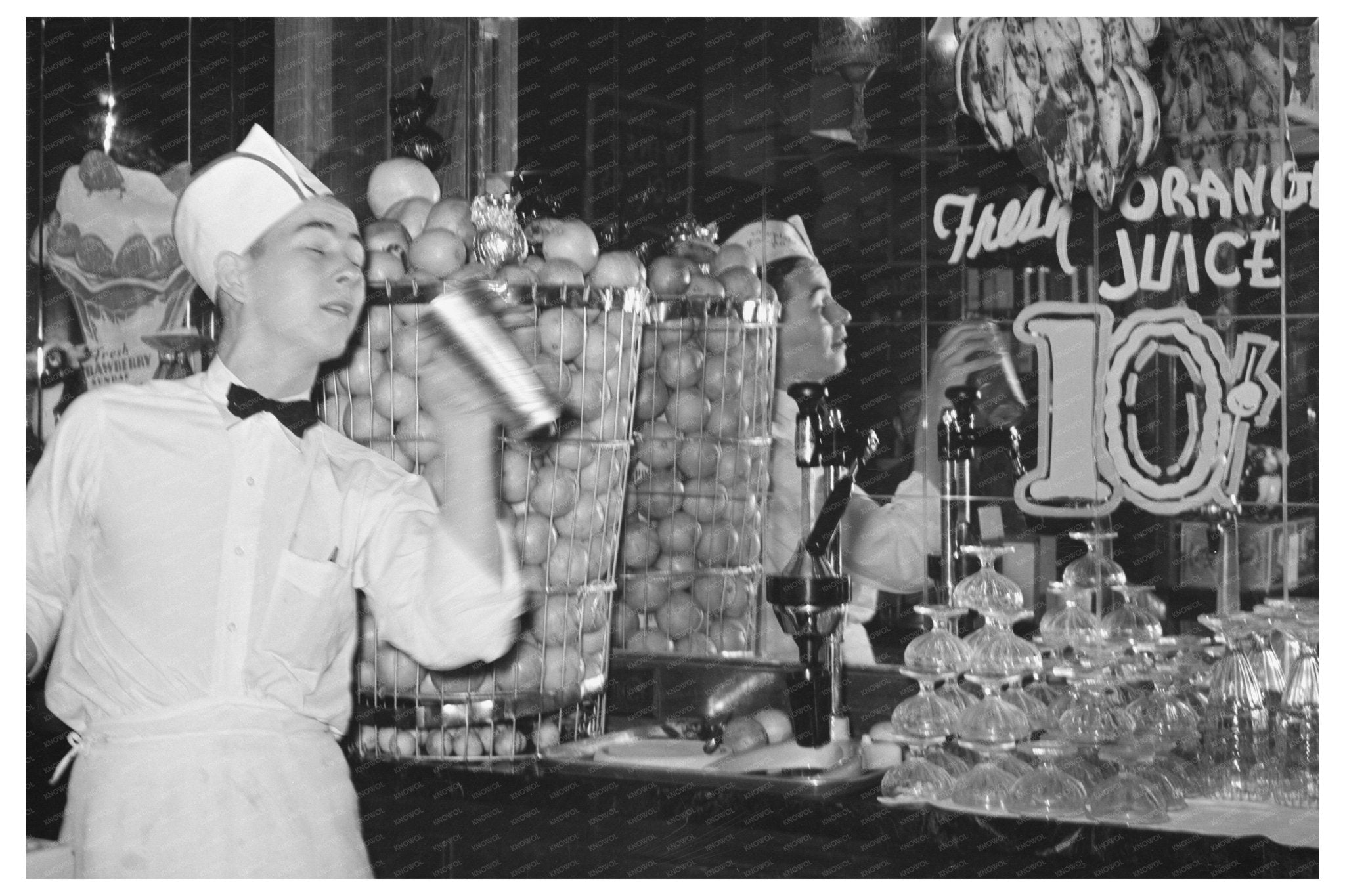 1939 Vintage Soda Jerk Making Malted Milkshakes in Texas - Available at KNOWOL