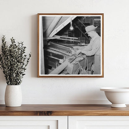 1939 Worker Adjusting Peanut Grader in Texas Plant - Available at KNOWOL