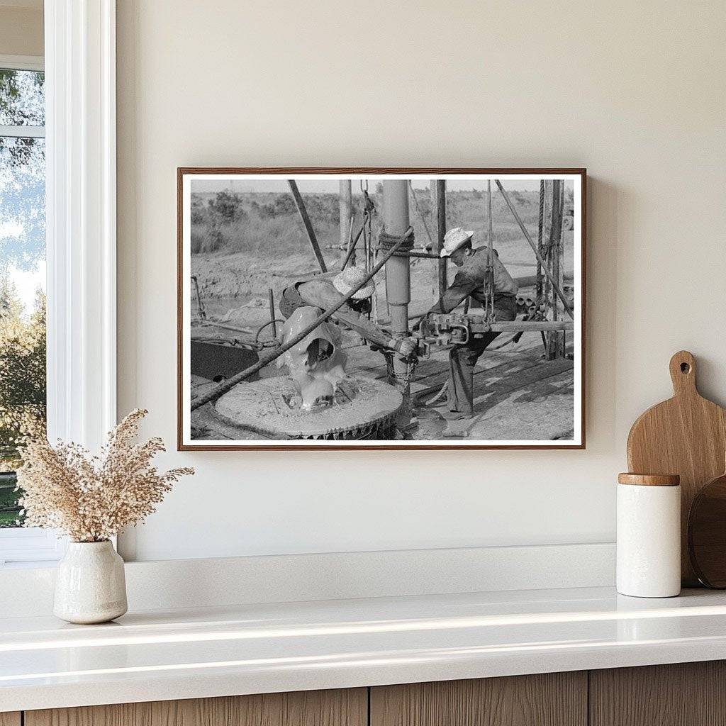 1939 Workers Installing Drilling Pipe at Oklahoma Oil Well - Available at KNOWOL