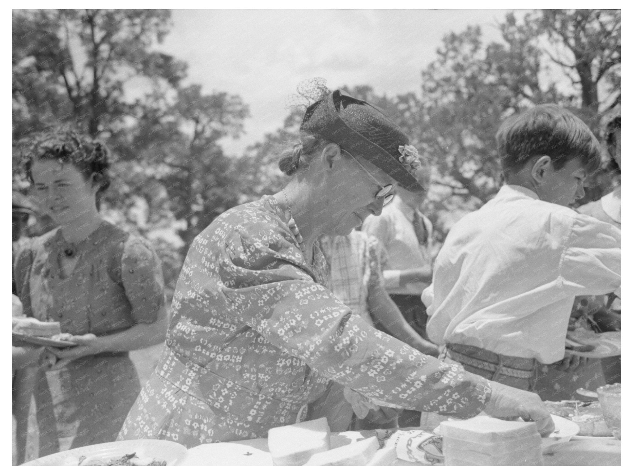 1940 Farm Woman Prepares Food at Community Sing in Pie Town - Available at KNOWOL