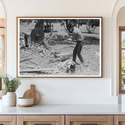 1940 Farmer Chopping Wood in Pie Town New Mexico - Available at KNOWOL