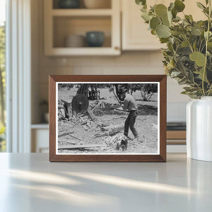 1940 Farmer Chopping Wood in Pie Town New Mexico - Available at KNOWOL