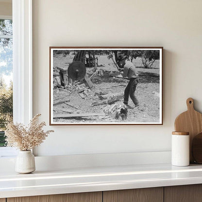 1940 Farmer Chopping Wood in Pie Town New Mexico - Available at KNOWOL