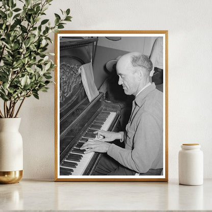 1940 Migratory Laborer Playing Piano in Arizona Camp - Available at KNOWOL