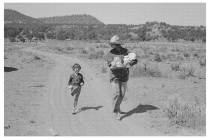 1940 Mrs. Caudill and Daughter Moving to Pie Town Dugout - Available at KNOWOL