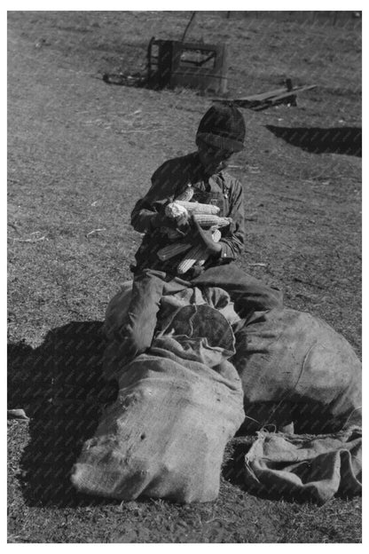 1940 Vintage Photo of Child Eating Black Walnuts in Oklahoma - Available at KNOWOL