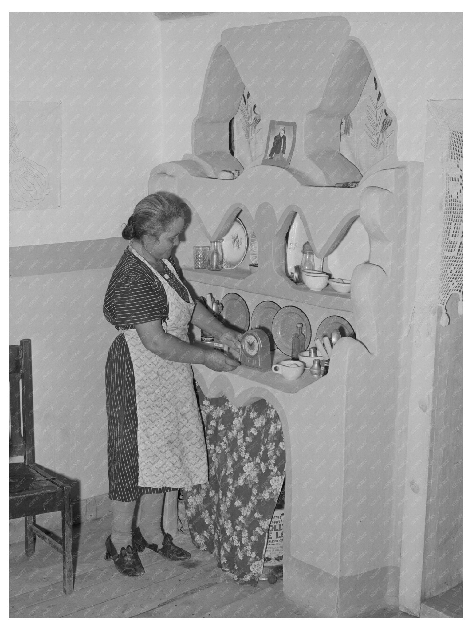 1940 Vintage Photo of Woman with Adobe Cupboard in New Mexico - Available at KNOWOL