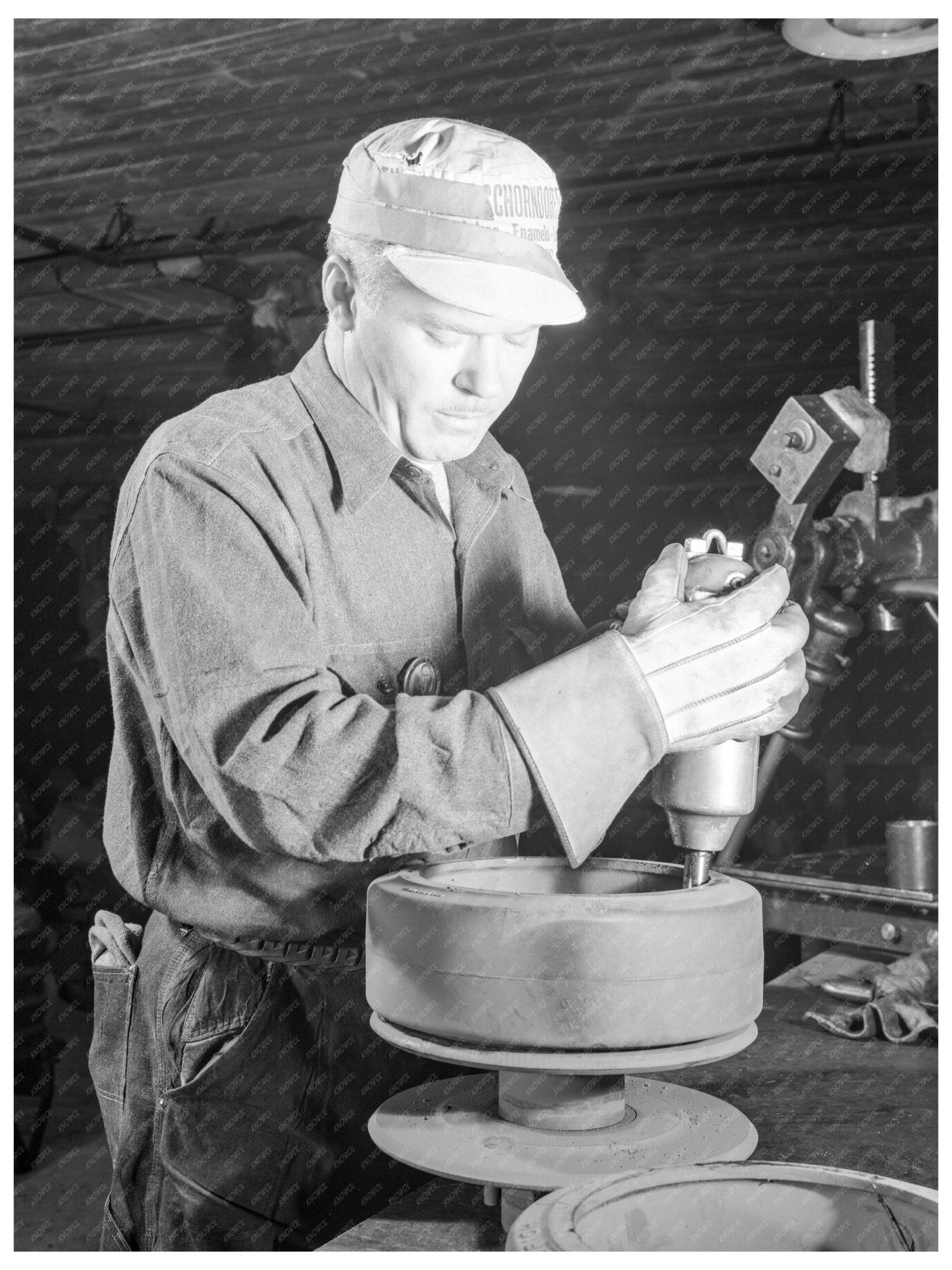 1941 Worker Prepares Rollers for Halftrack Scout Car Assembly - Available at KNOWOL