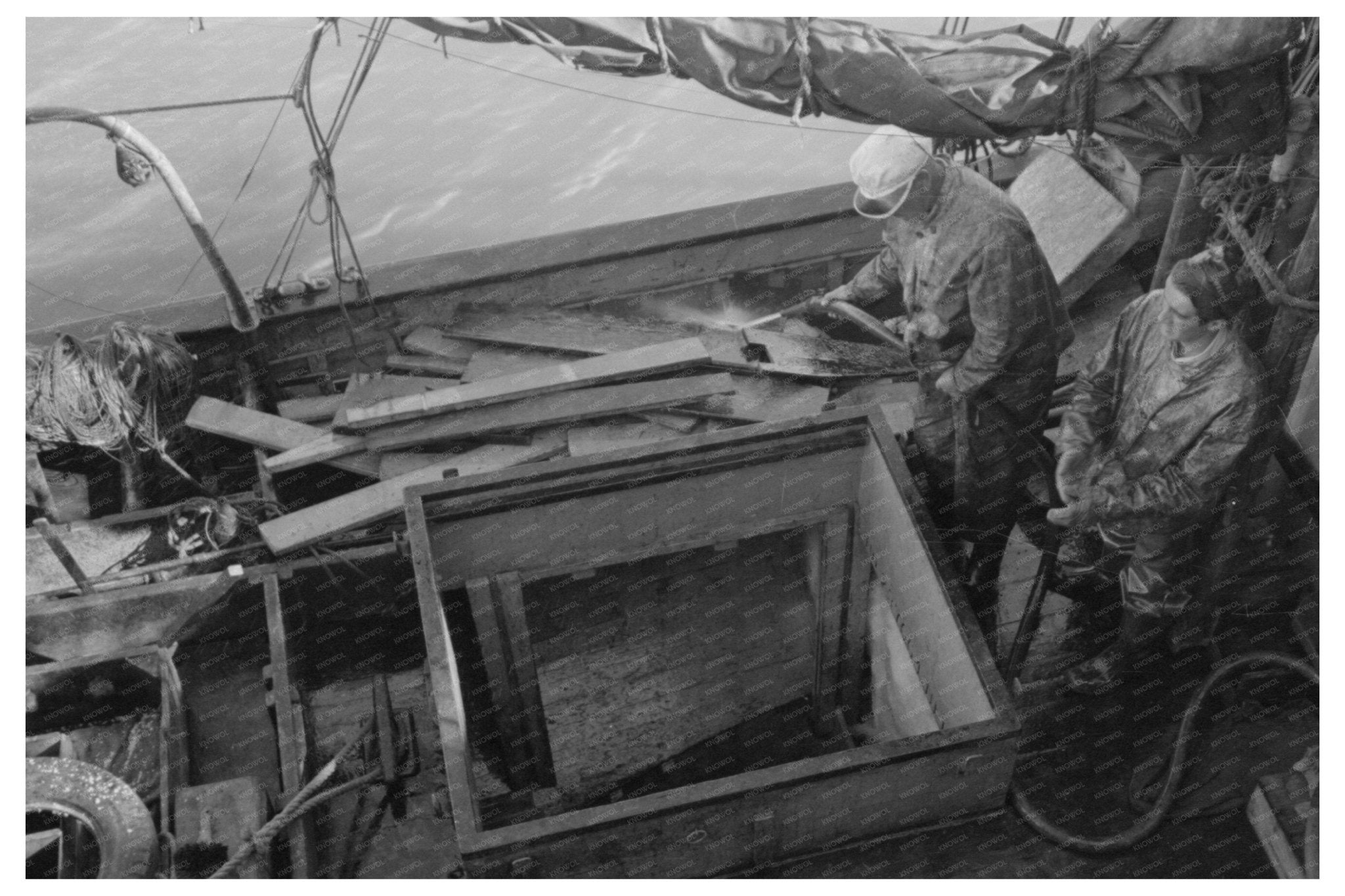 1941 Workers Washing Fishing Boat in Astoria Oregon - Available at KNOWOL