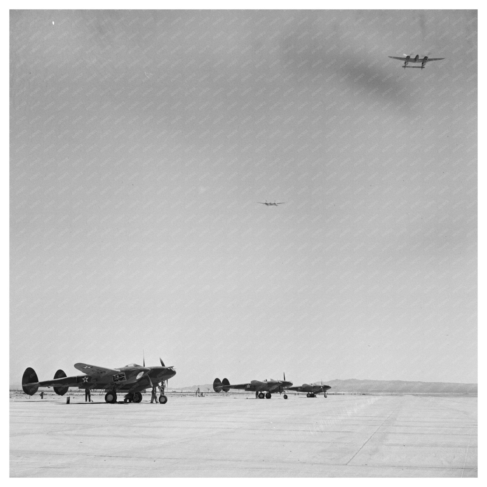 1942 Interceptor Squadron Flyover at Lake Muroc California - Available at KNOWOL