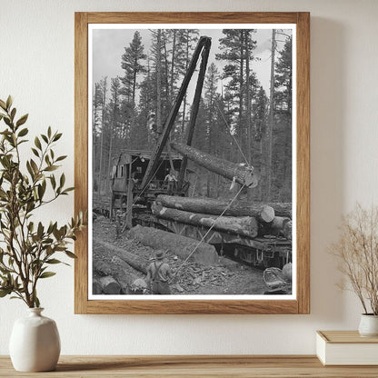 1942 Loading Logs from Trucks to Flatcars in Oregon - Available at KNOWOL