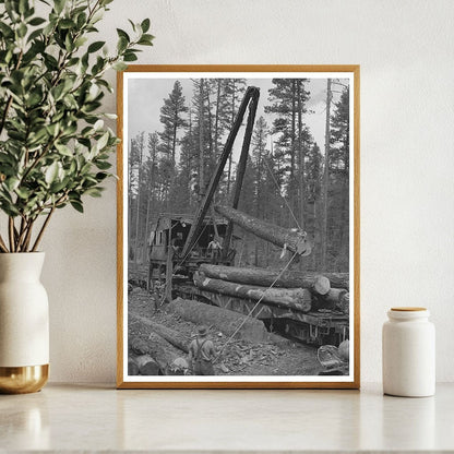 1942 Loading Logs from Trucks to Flatcars in Oregon - Available at KNOWOL