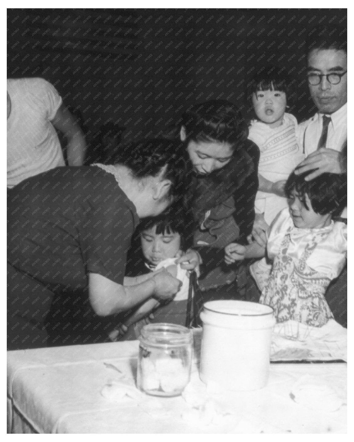 1942 Vintage Image of Japanese American Girls Receiving Inoculations During Evacuation - Available at KNOWOL