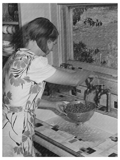 1942 Woman Washing Berries in Ola Idaho with Running Water - Available at KNOWOL