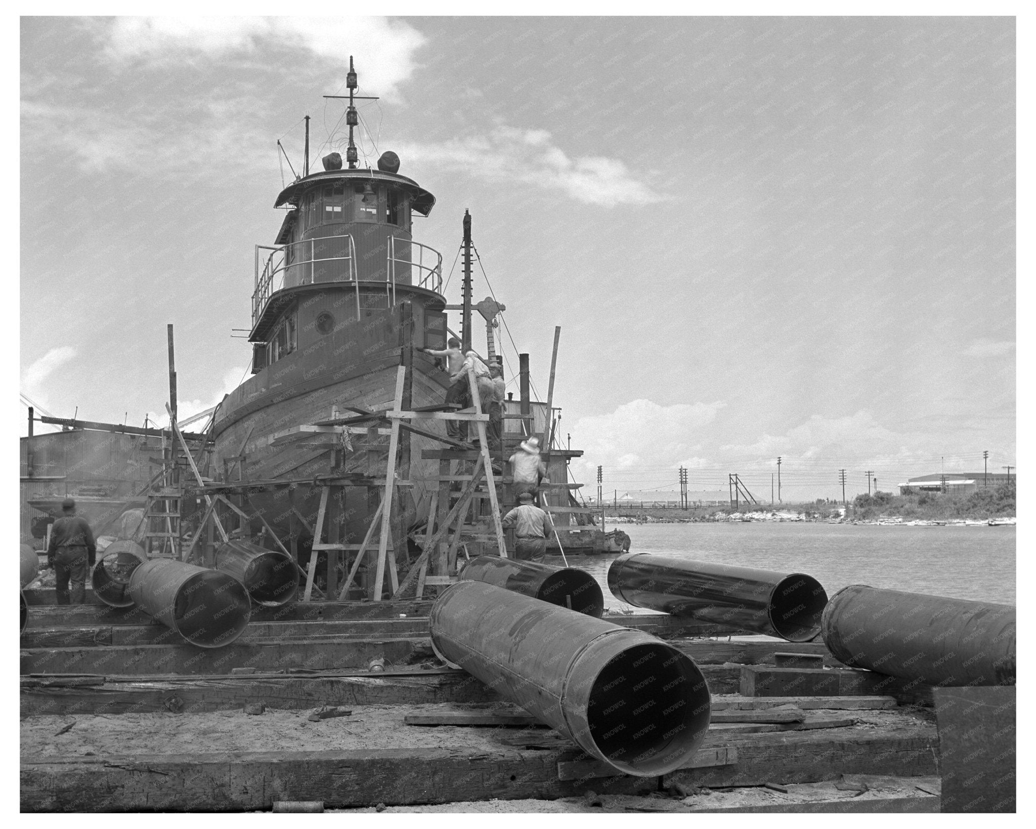 1942 Wooden Tug Raymond Reconditioning in Seabrook Louisiana - Available at KNOWOL