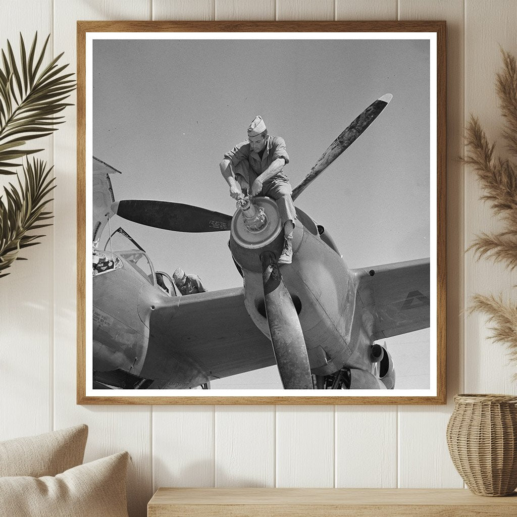 1942 Worker Servicing Interceptor Plane at Lake Muroc - Available at KNOWOL