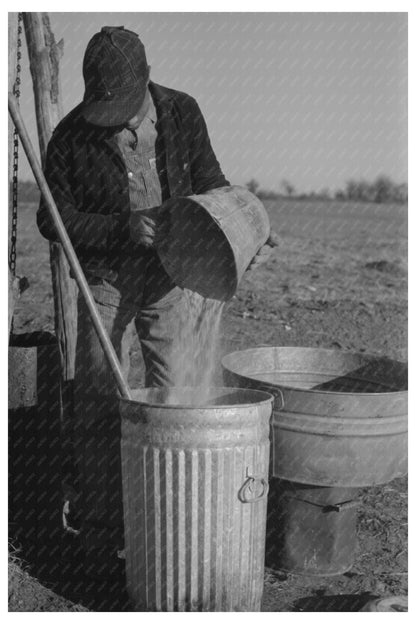 1944 Tenant Farmer Mixing Hog Feed in Oklahoma - Available at KNOWOL