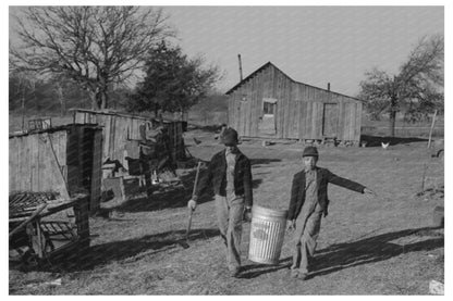 1944 Vintage Photo of Child Feeding Hogs in Oklahoma - Available at KNOWOL