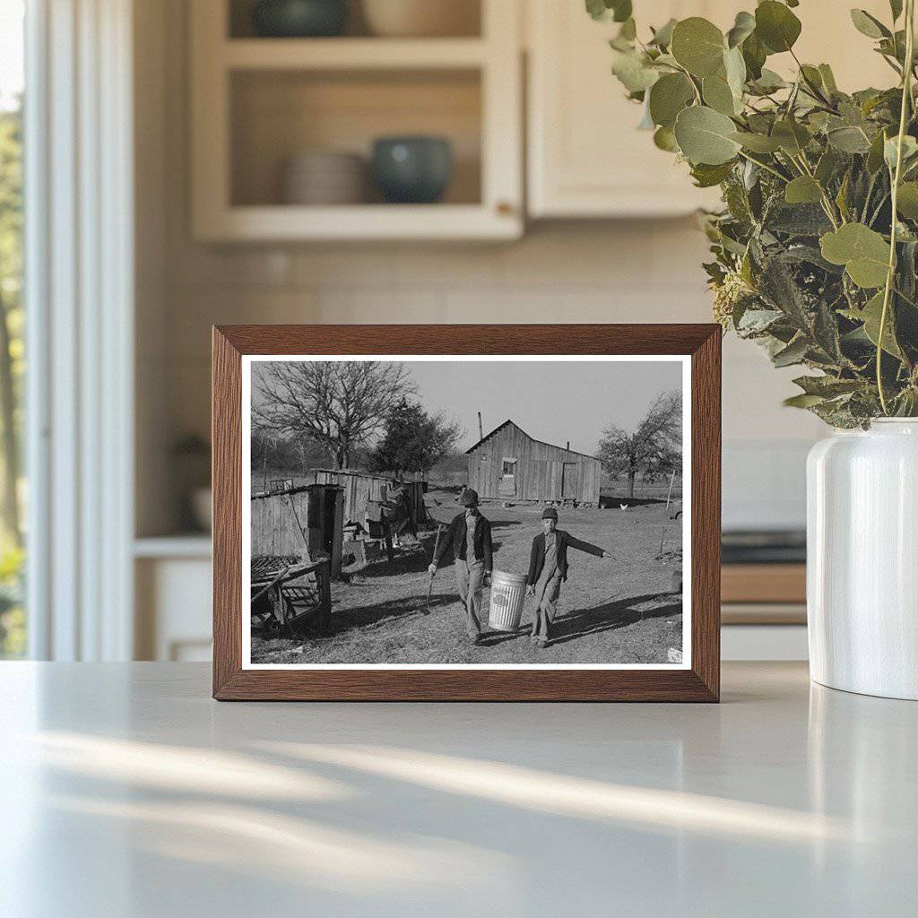 1944 Vintage Photo of Child Feeding Hogs in Oklahoma - Available at KNOWOL