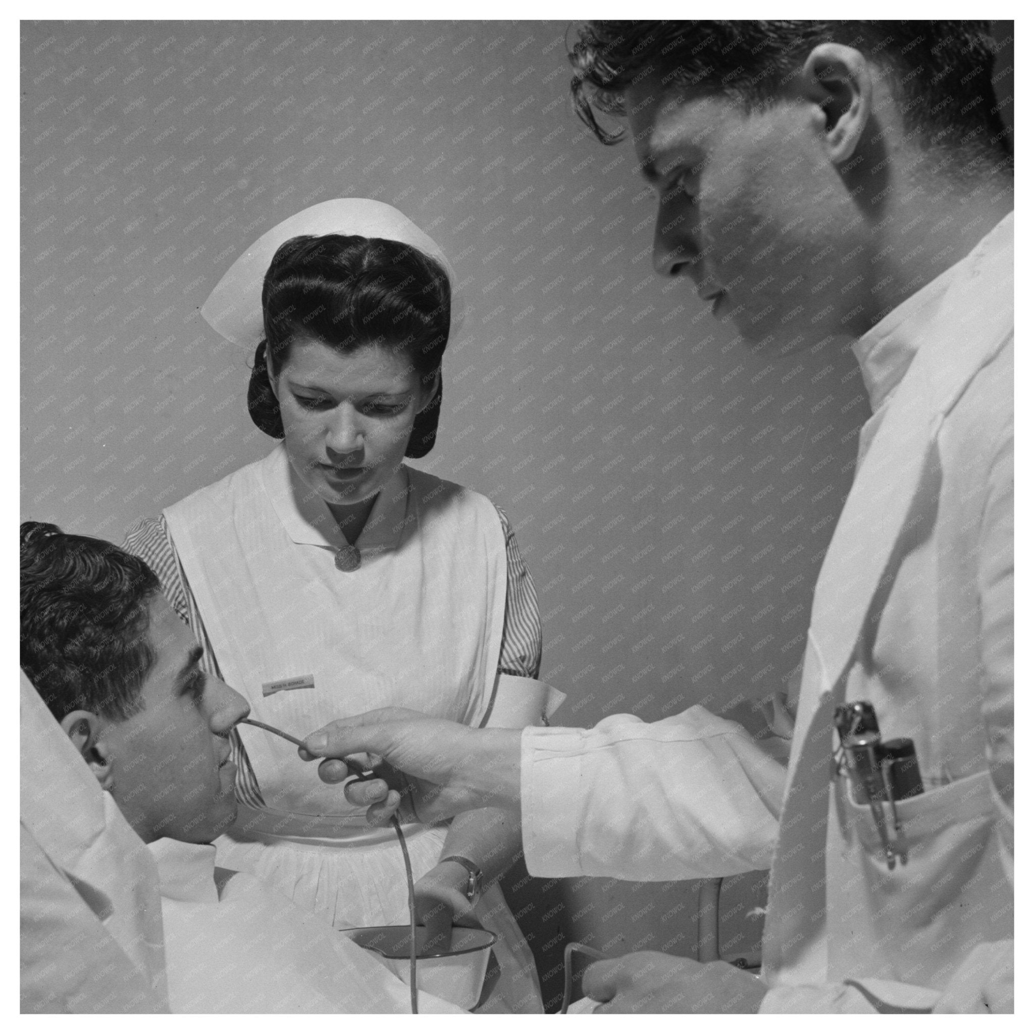 1945 Nurse Training Assisting Doctor with Gastric Analysis - Available at KNOWOL