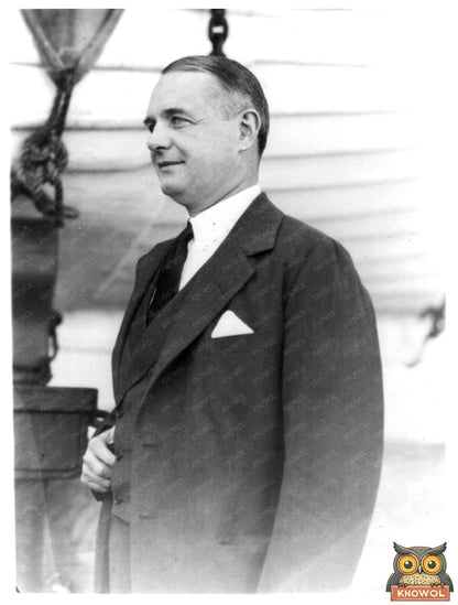 1930s Maritime Leader Portrait Near Vintage Boat