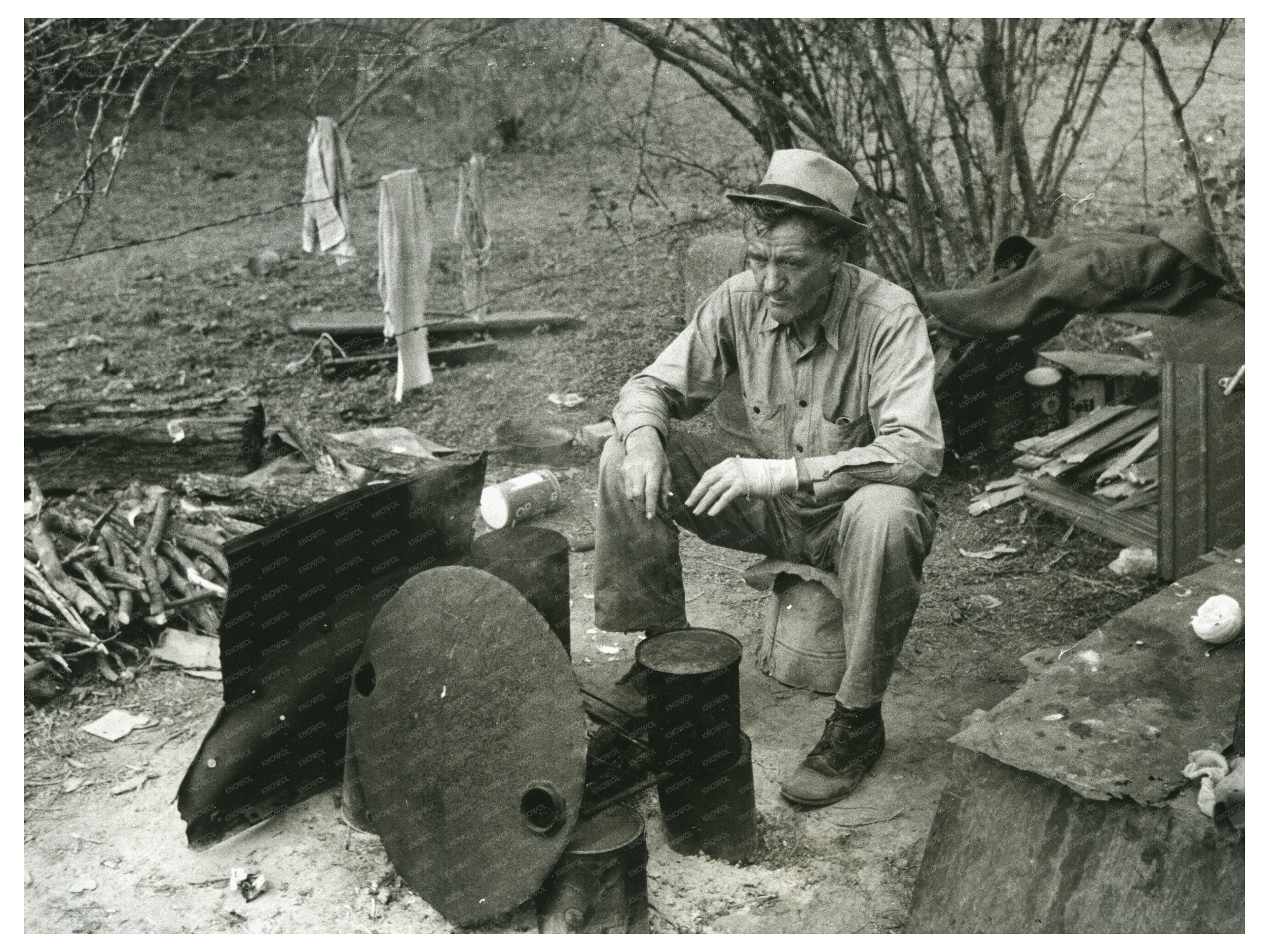 Migrant Worker by Campfire Harlingen Texas 1939
