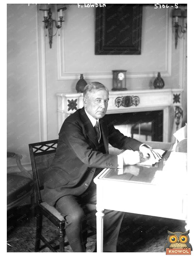 F. Lowden: A Moment of Inspiration at His Desk