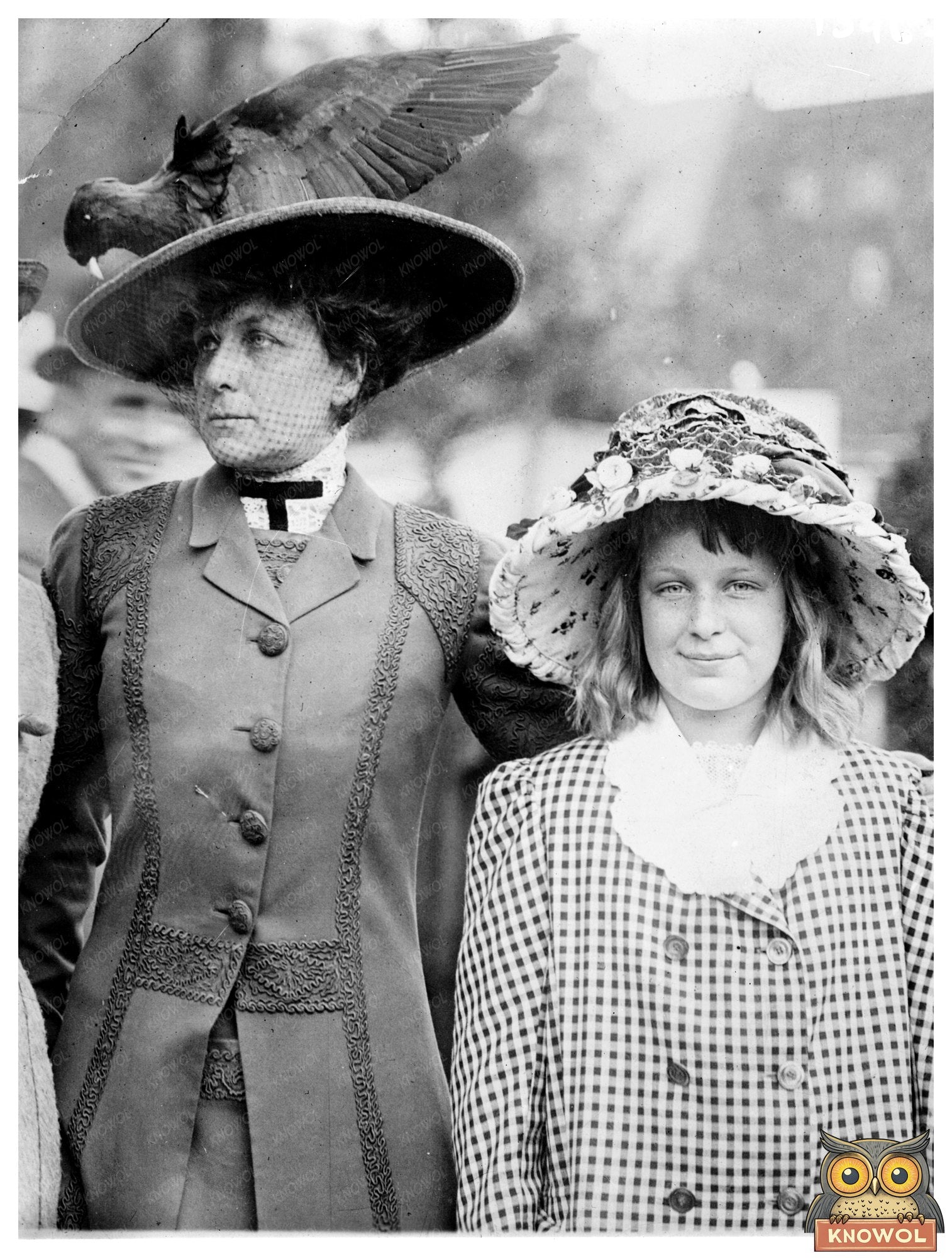 Elegant Mother-Daughter Duo in Early 20th Century