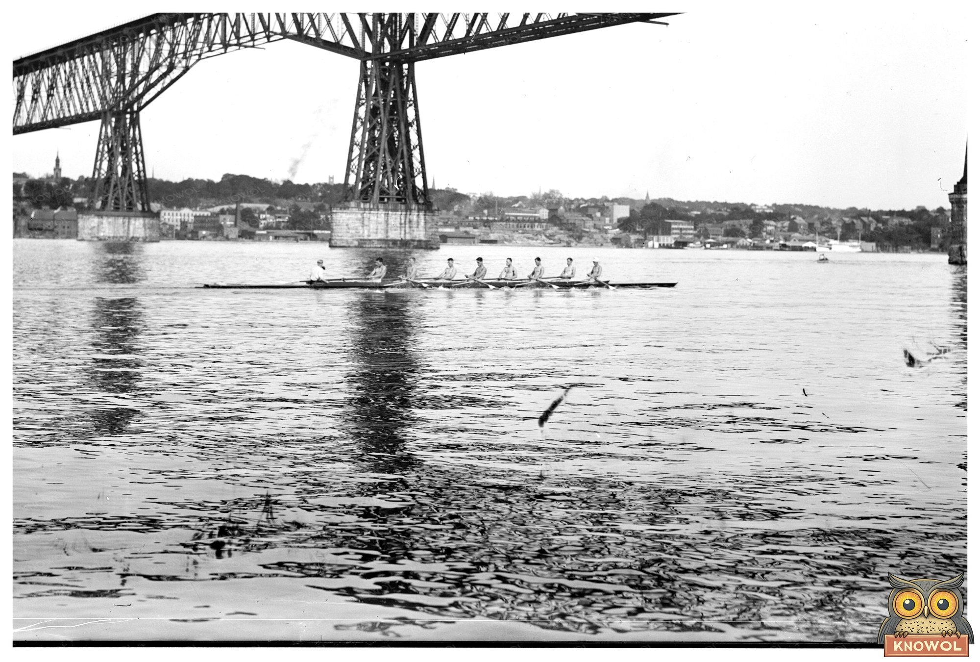 1913 Collegiate Rowing Team in Dynamic Action