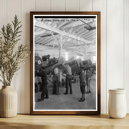 1917 Moment: Worker Fitting Propeller on Vintage Plane