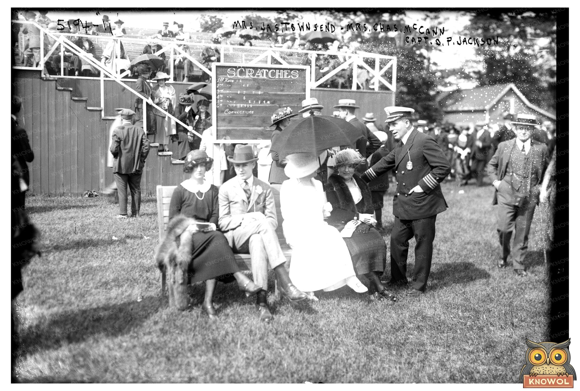 1920s Social Gathering: Ladies and Captain Posed Together