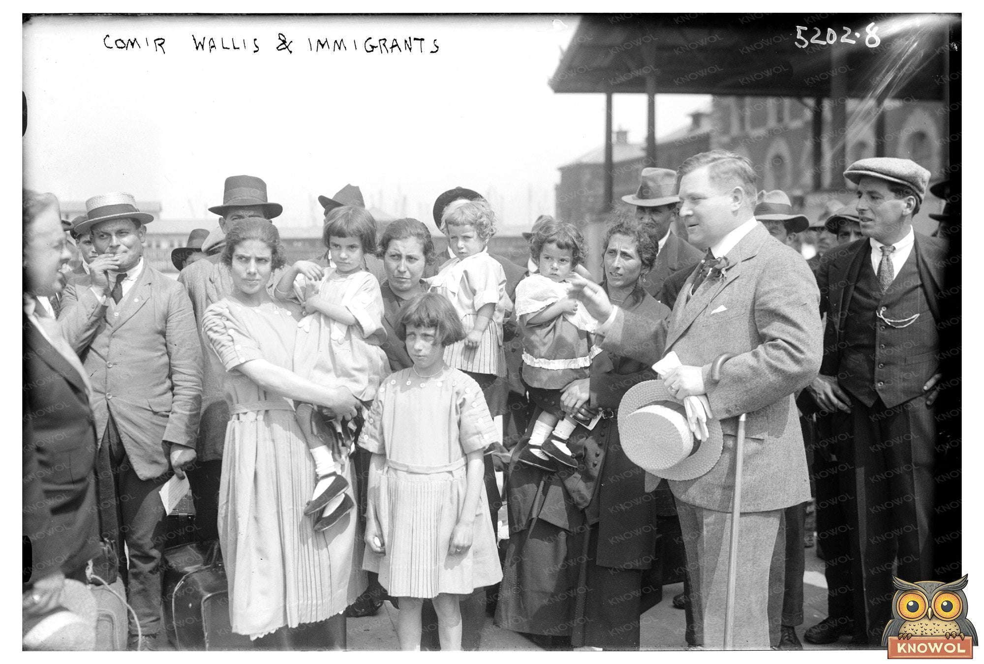 1920 Moment: Commissioner Wallis with New Immigrants