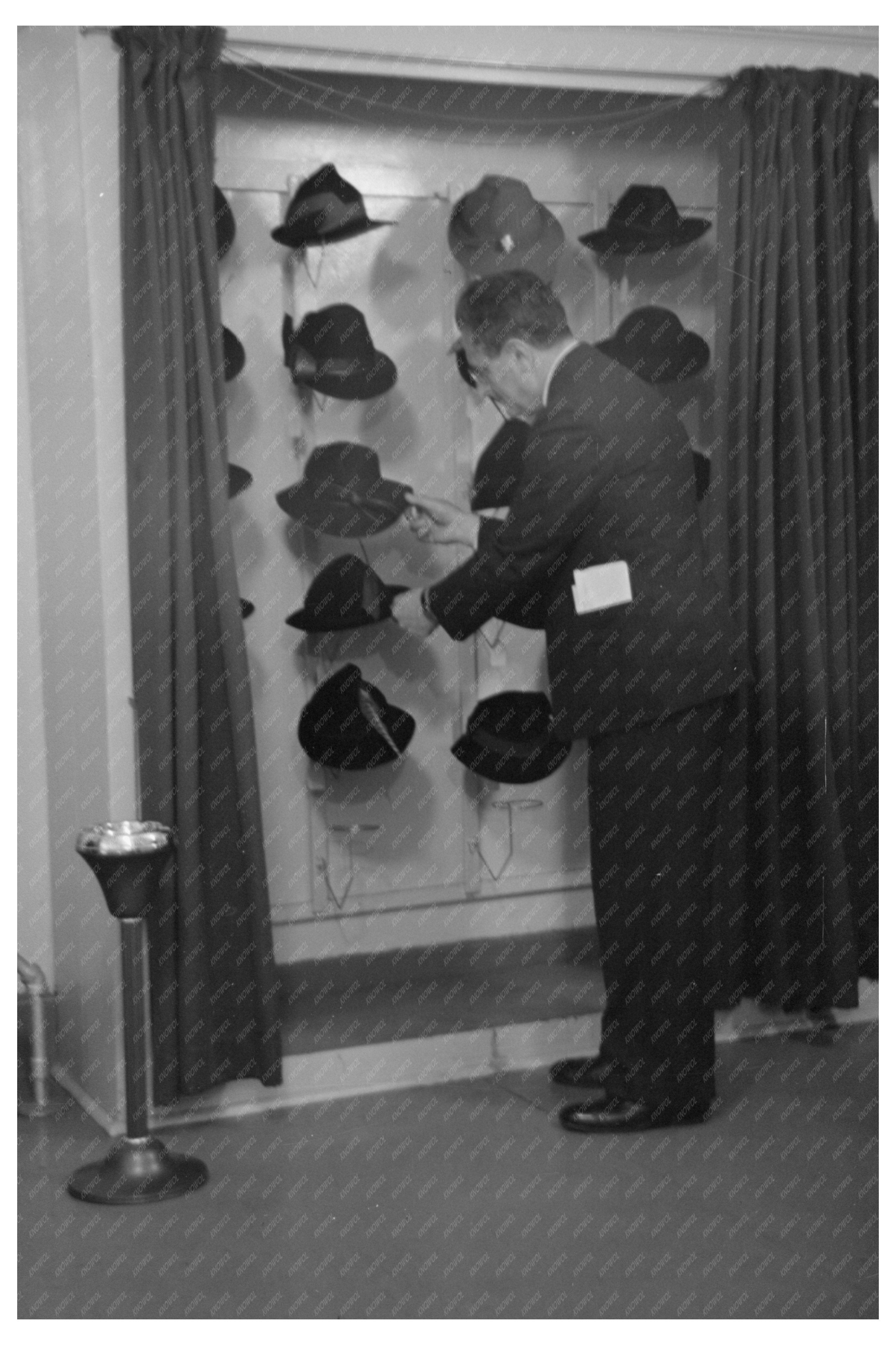 Model Trying Hat for Buyer in NYC Showroom November 1936