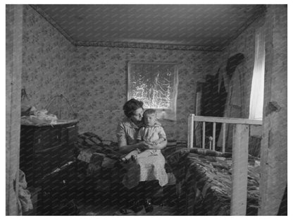 Mother and Child in Nissen Hut Iowa December 1936