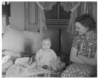 Mrs. Charles Benning and Baby in Shantytown 1936