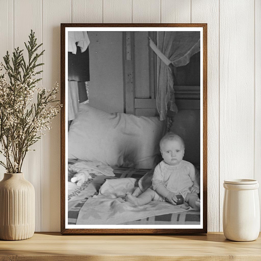 Mrs. Charles Benning and Baby in Shantytown Iowa 1936