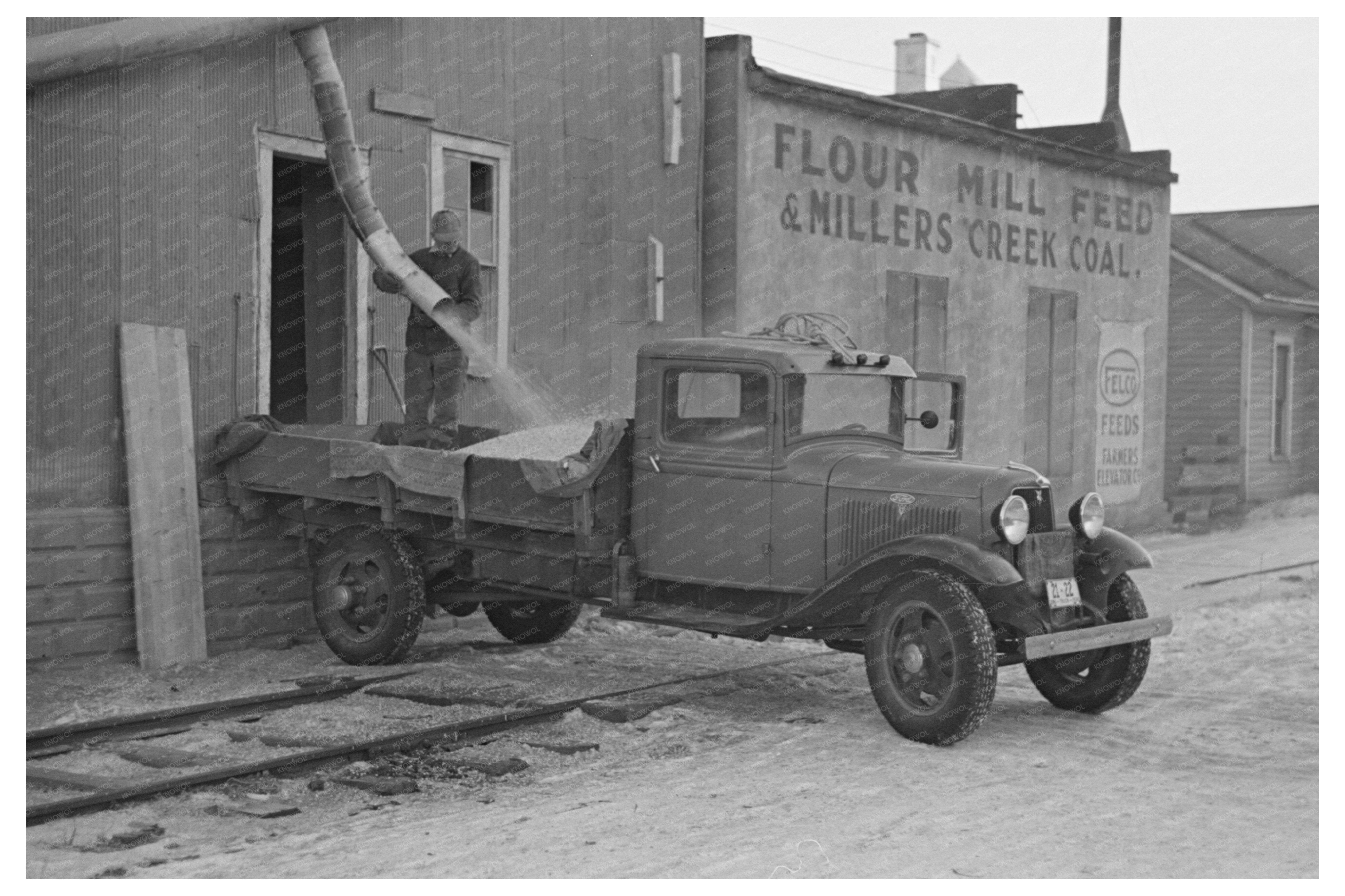 Workers Loading Corn in Spencer Iowa December 1936